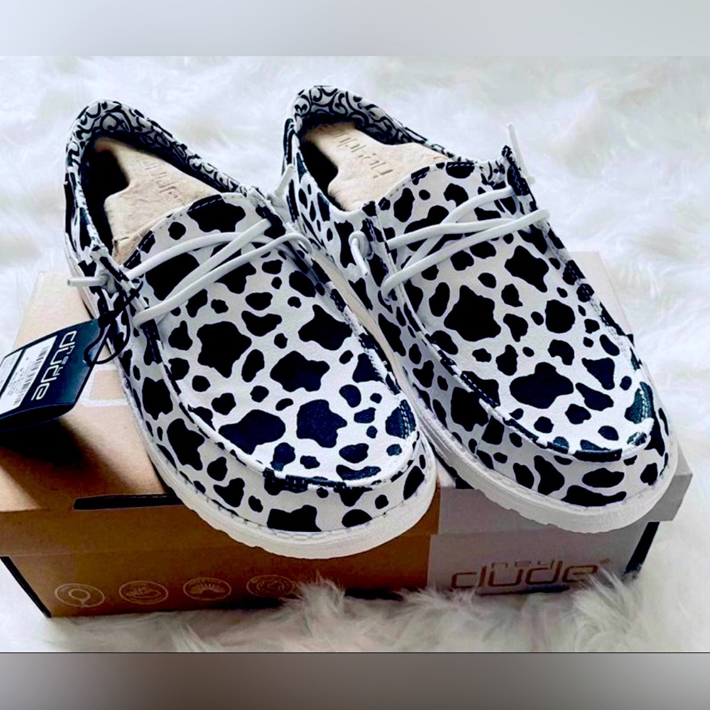Women’s cow print Hey Dudes size 8